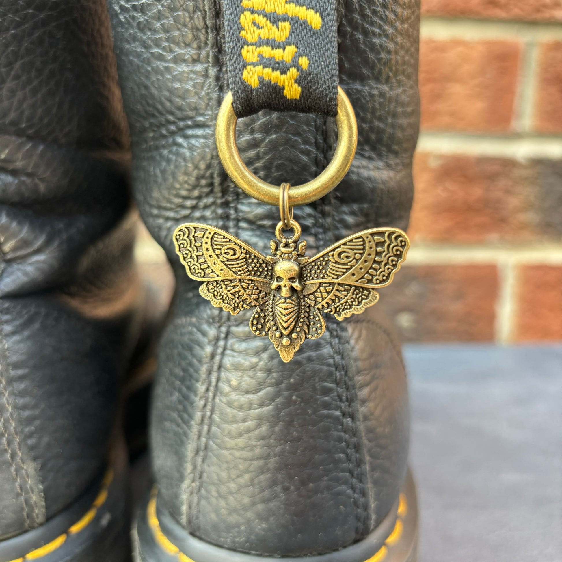 Pair of Bronze Death Moth Doc Charms