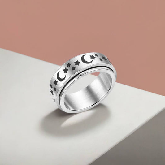 Stay cool, calm, and collected while you fidget with this silver spinning anxiety ring!