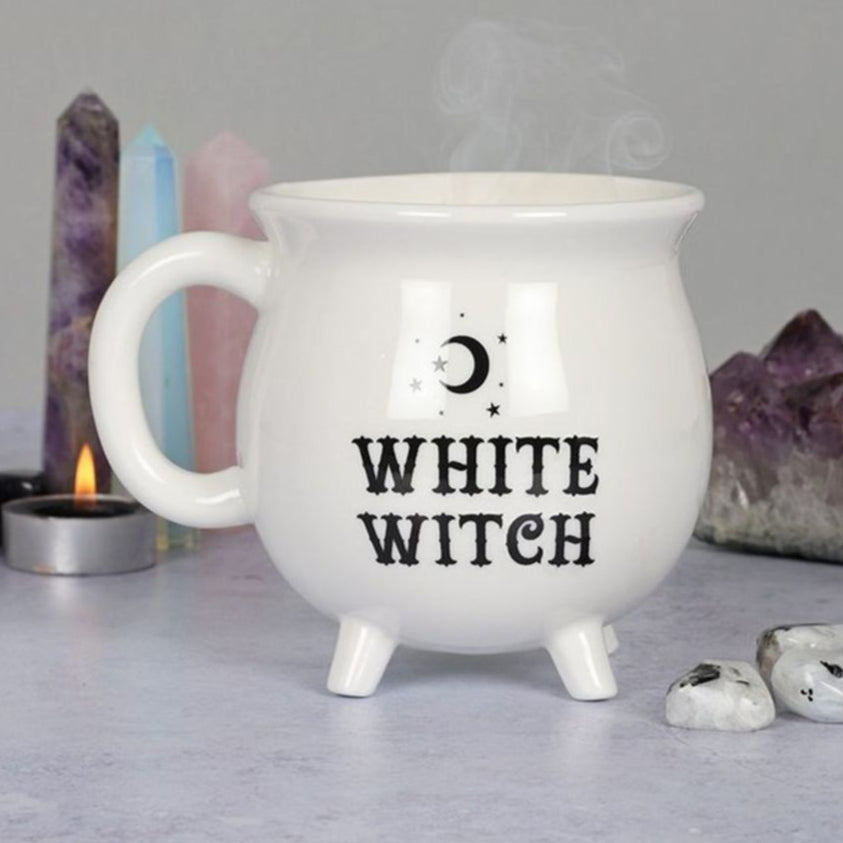 Get ready to brew your potions in style with our ceramic White Witch Cauldron Mug. Perfect for all your witchy needs, this cauldron-shaped mug is sure to add a touch of magic to your morning routine. Made with high-quality materials, it's both durable and stylish. Grab yours today and stir up some fun!